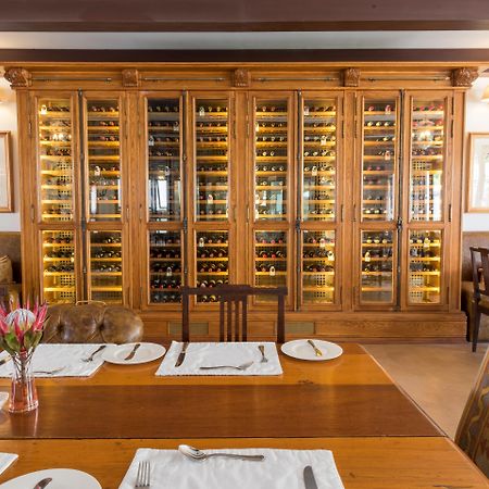 드로스티 호텔 Graaff-Reinet 외부 사진 Wine rack at the restaurant