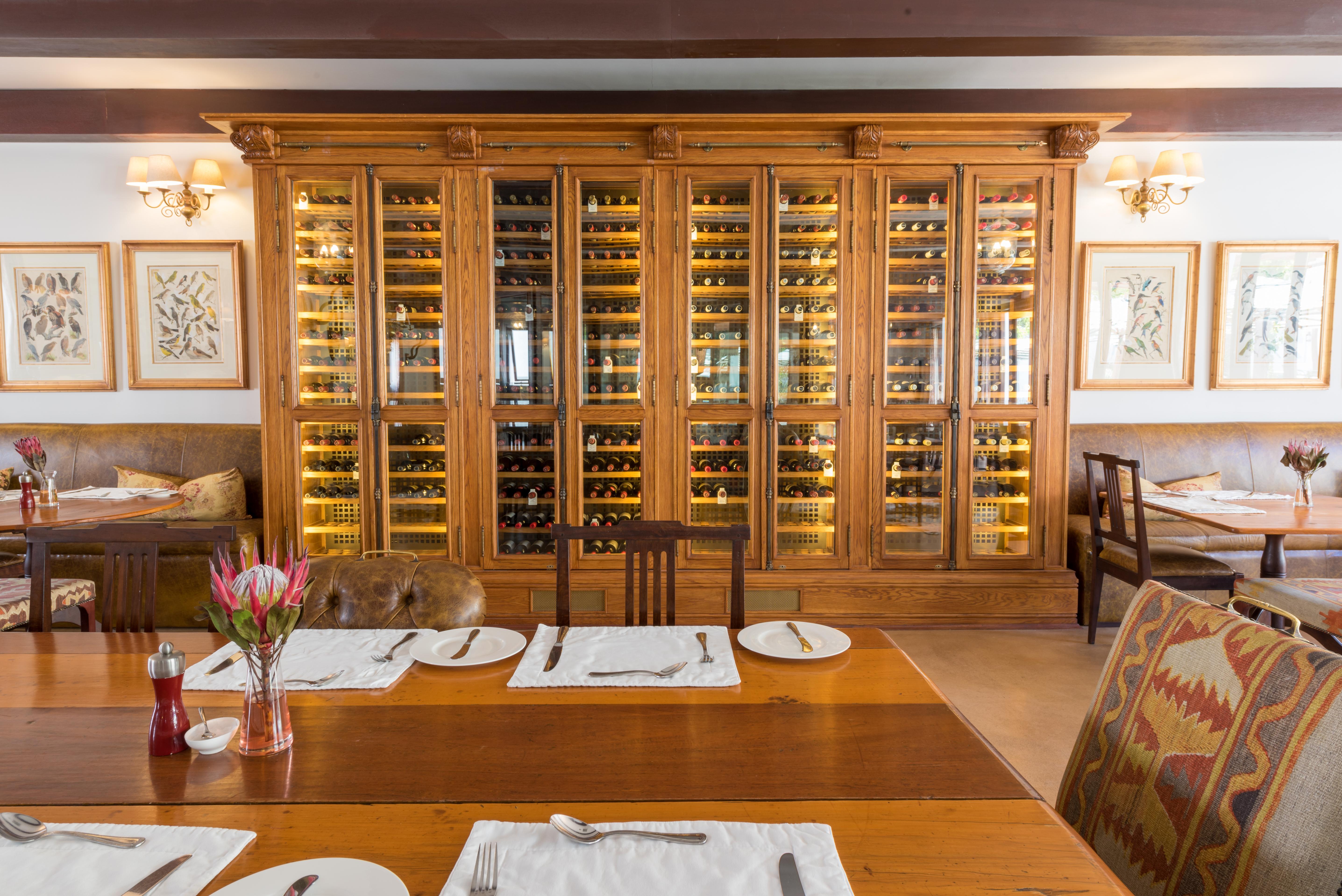 드로스티 호텔 Graaff-Reinet 외부 사진 Wine rack at the restaurant